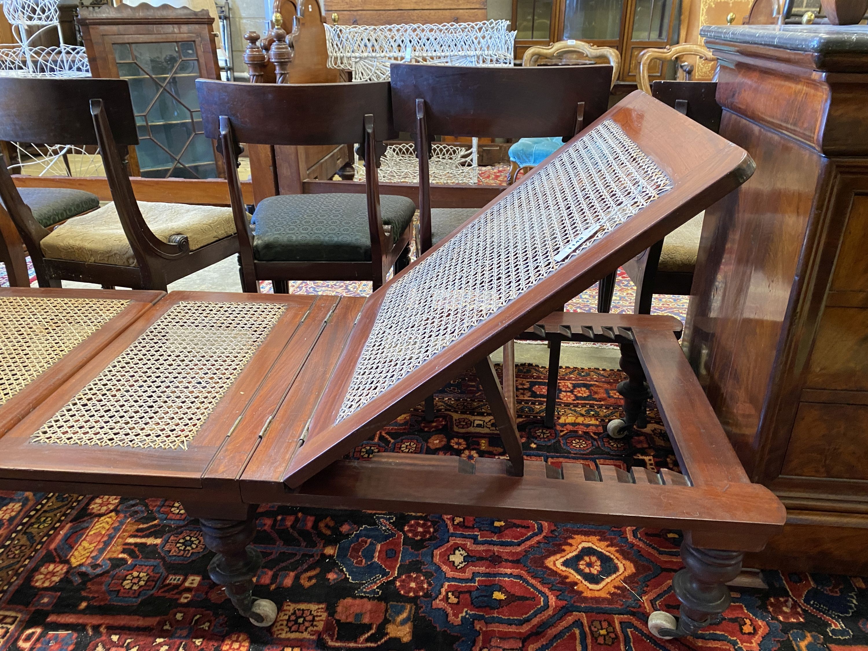 A Victorian caned mahogany folding campaign day bed, length 186cm, width 71cm